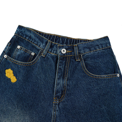 Puppy patchwork embroidered washed denim jeans